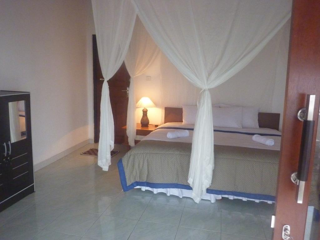 Tambun Sari Beach Homestay อาเม็ด ห้อง รูปภาพ